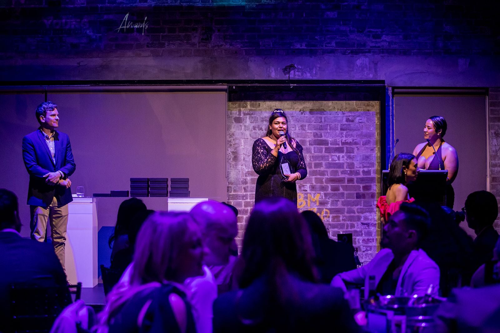 2025 Sydney Young Entrepreneur Awards Gala Dinner Winners accepting trophies on stage at the 2025 Sydney Young Entrepreneur Awards